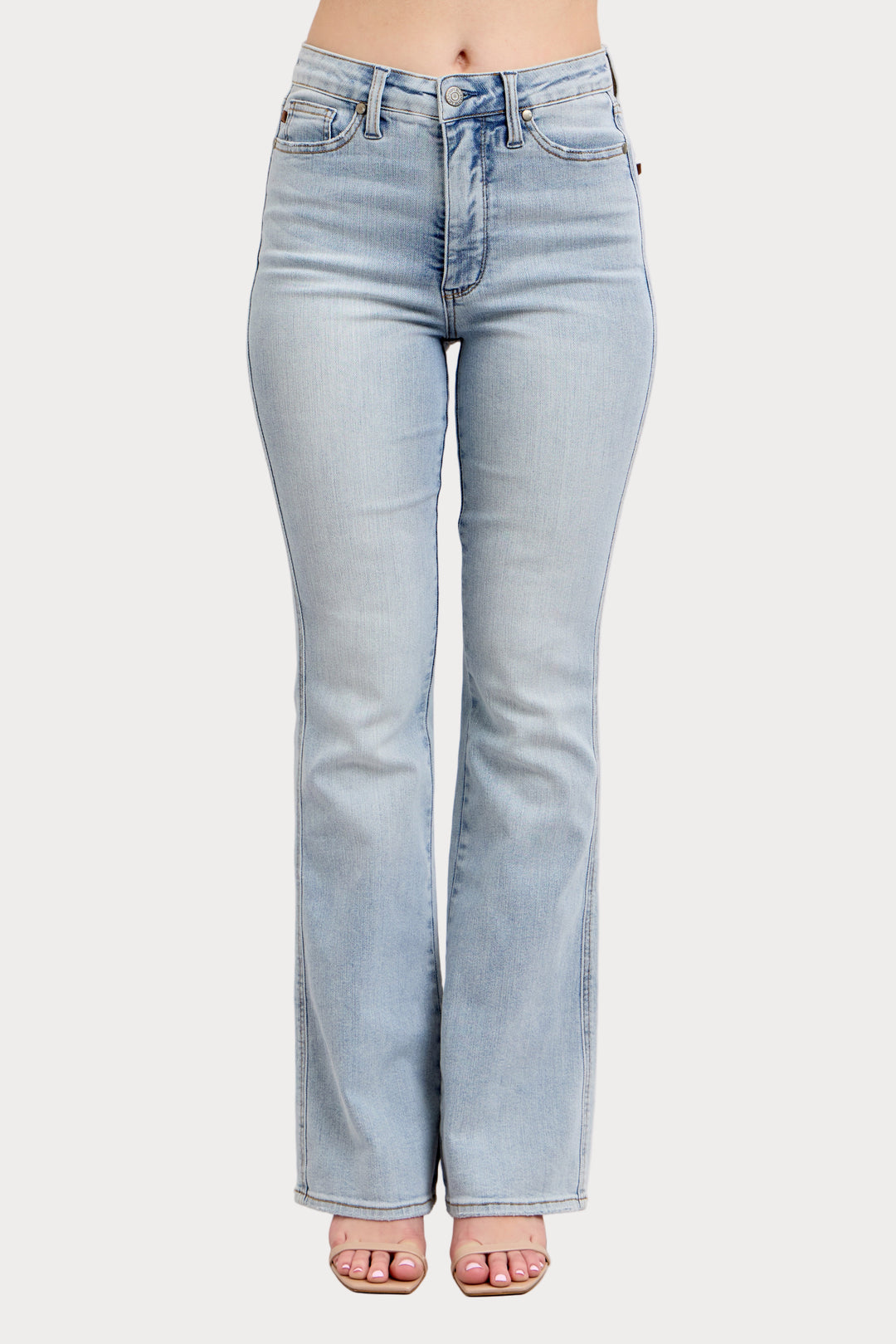 Light blue jeans on a plain background