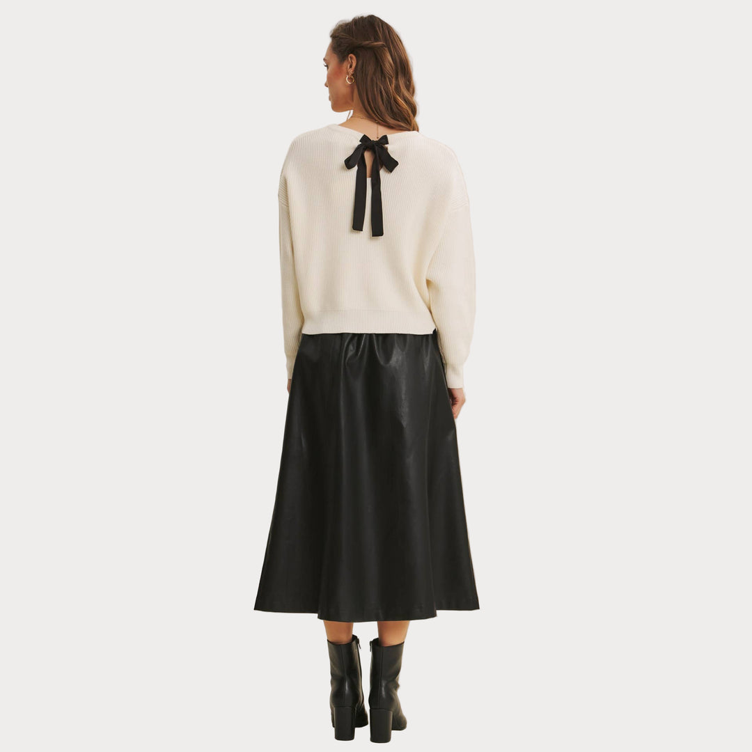 Back view showing keyhole cutout and satin ribbon tie accent.