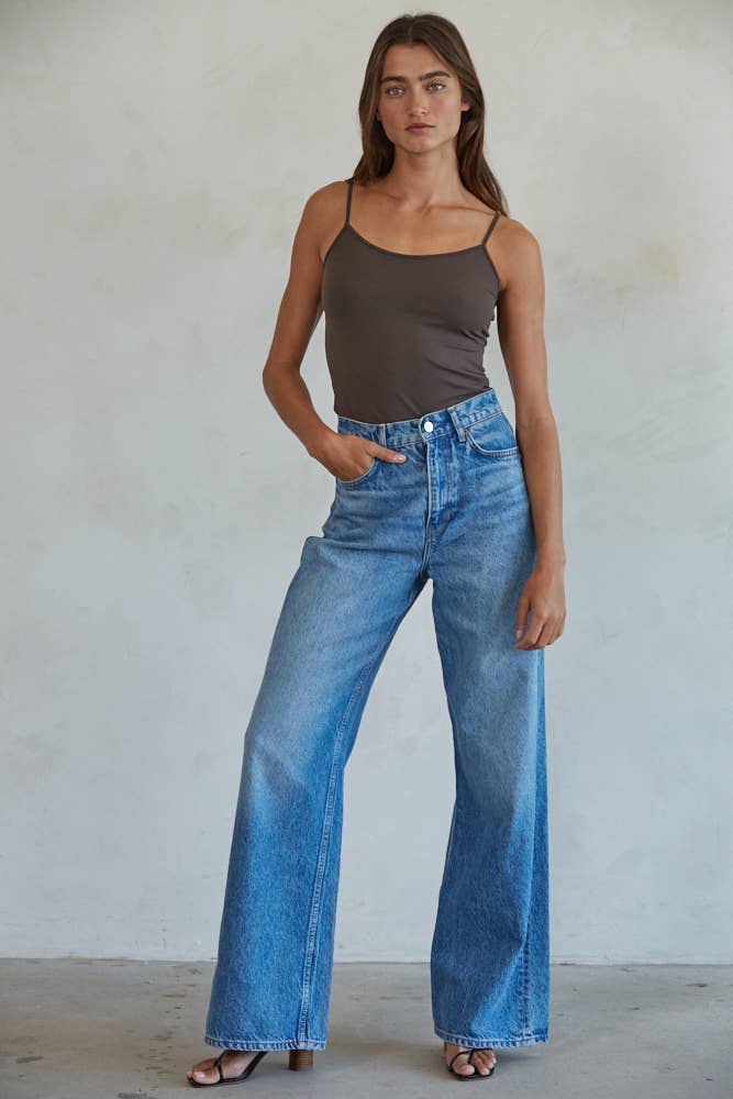 Seamless fudge brown full-length cami with thin straps, styled with denim for a sleek everyday look.