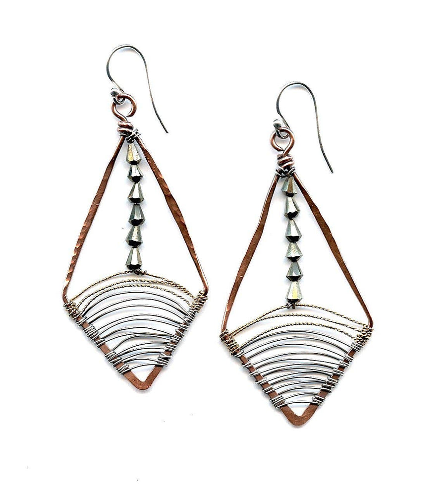 Handcrafted pyrite gemstone earrings with copper frame and oxidized sterling silver wire detail, designed by Art by Any Means in Rockport, Massachusetts.