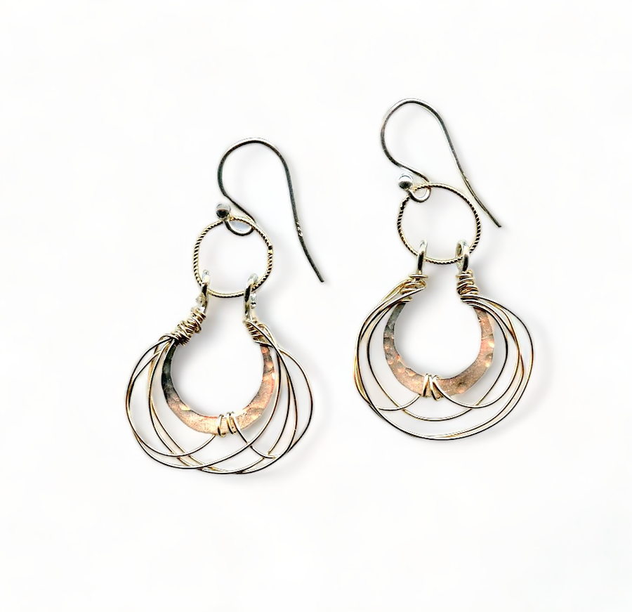 Hand-woven sterling silver and gold-filled earrings with crescent shape and French hooks, handmade by Art by Any Means in Rockport, Massachusetts.