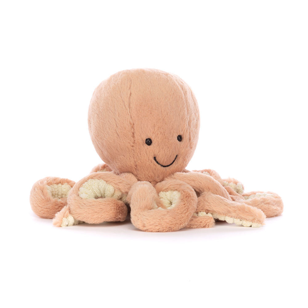 Odell Octopus plush with peach fur, cream-lined tentacles, and a smiling face.
