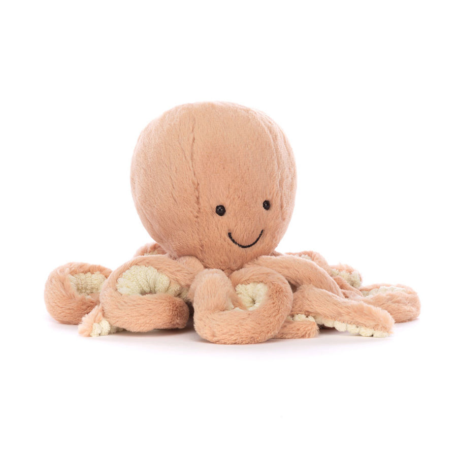 Odell Octopus plush with peach fur, cream-lined tentacles, and a smiling face.
