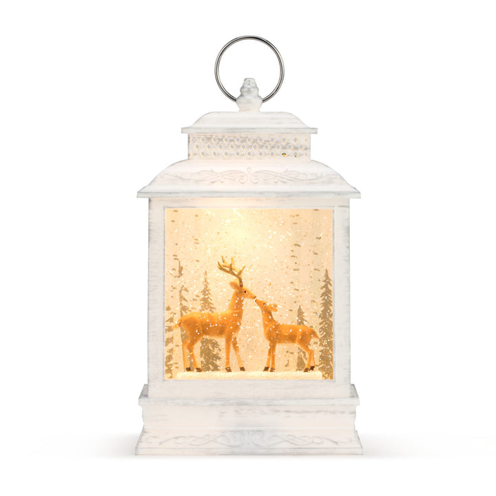 White deer lantern with glowing snowy woodland scene