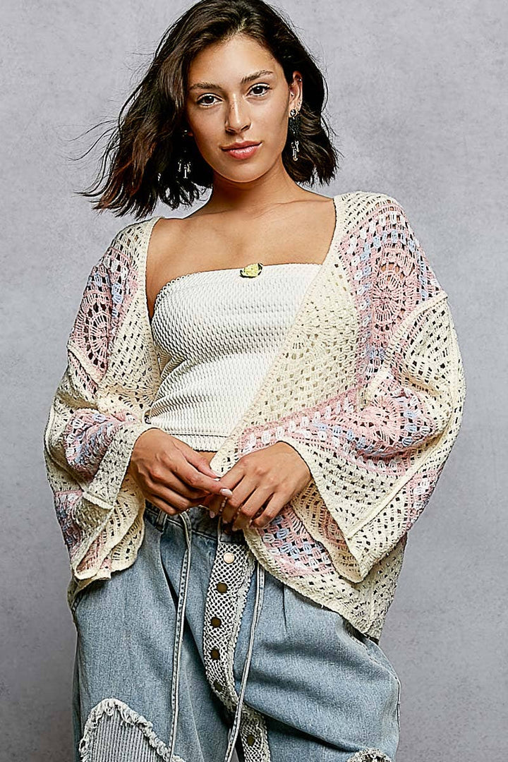 Crochet granny square cardigan with open front and relaxed fit