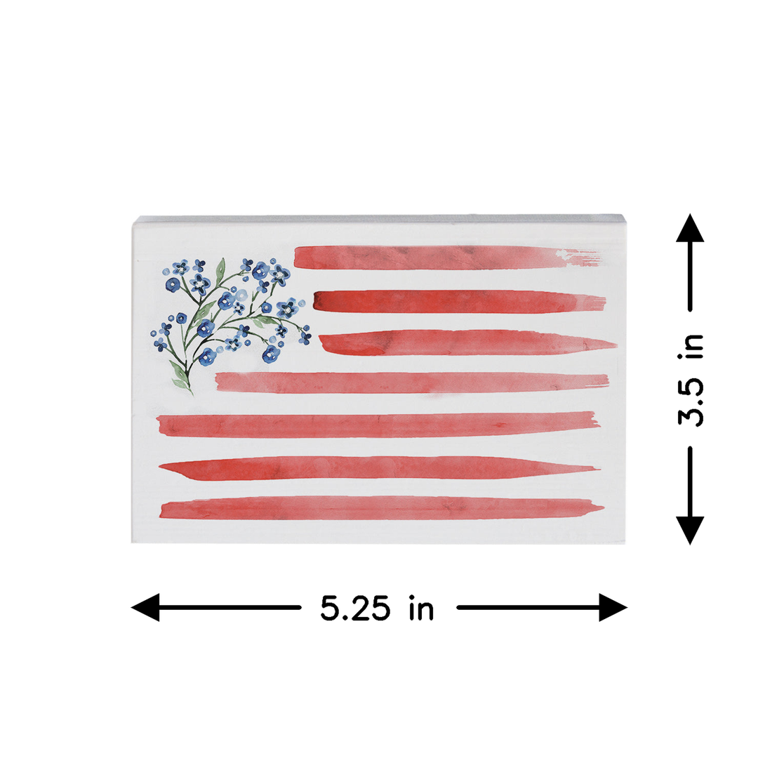 American flag with floral design and measurements on a white background