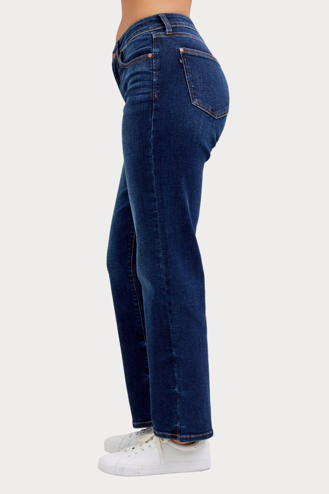 Model wearing Judy Blue mid-rise dark wash straight jeans with a short 30-inch inseam