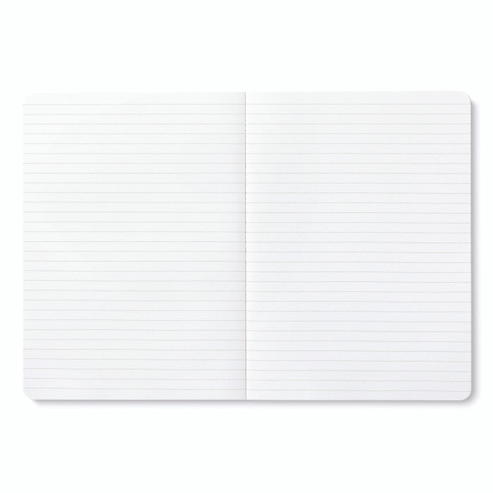 White notebook with grid pattern on a white background