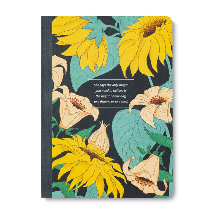 Floral notebook cover with sunflowers and text on a dark background