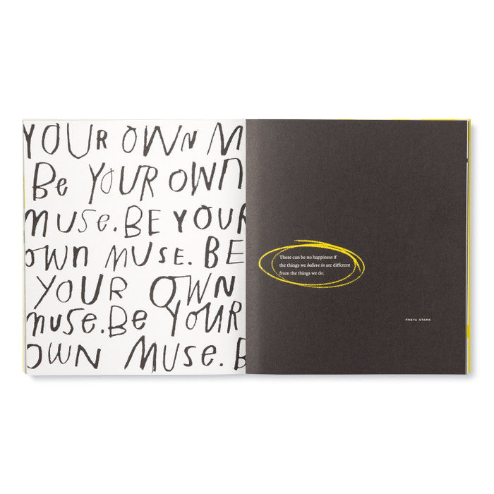 Book with text 'Be your own muse' on a white background