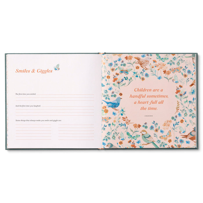 Open book with floral design and text on a white background