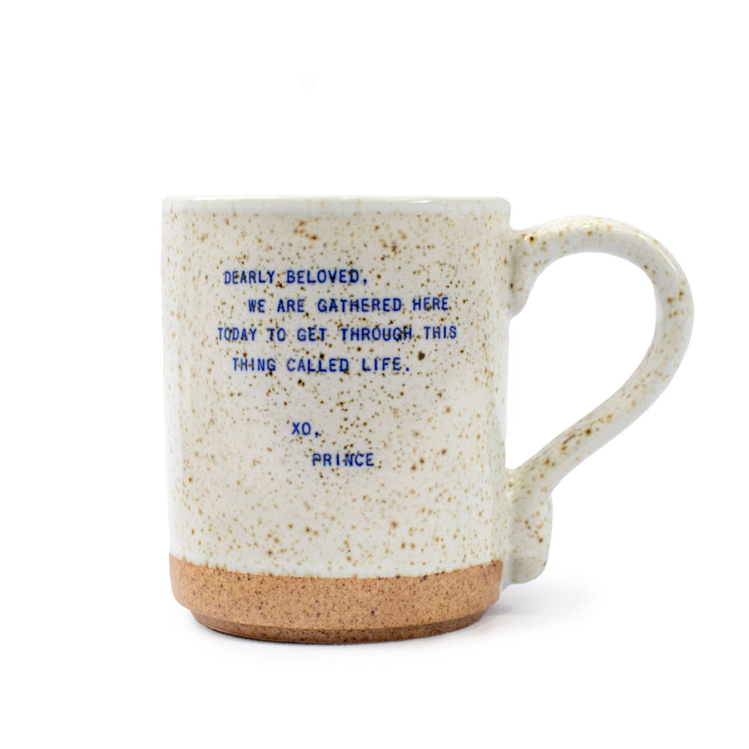 Handmade XO stoneware mug with Prince quote, speckled glaze, neutral tones, and ceramic handle on a white background