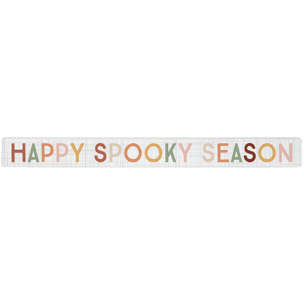 Decorative wooden block with 'Happy Spooky Season' text in fall colors, faded plaid background. Shown on a white background