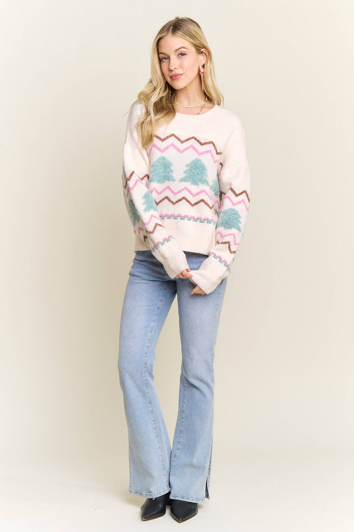 “Cream knit sweater with fluffy textured Christmas trees and pastel chevron stripes”