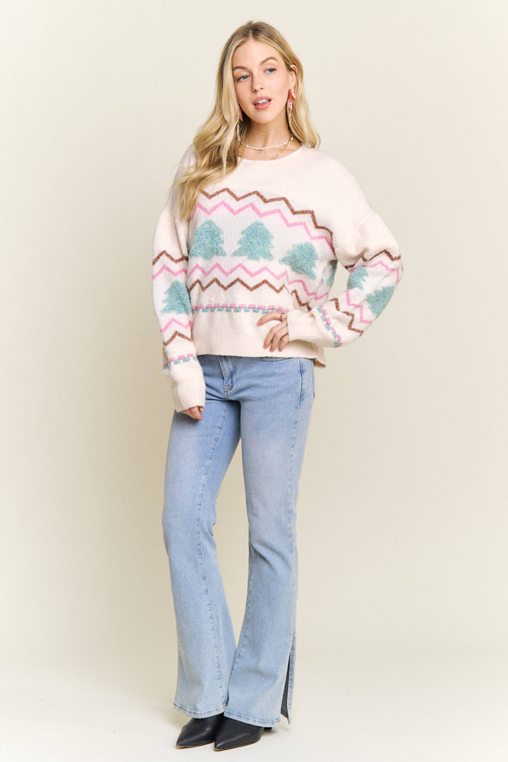 “Cream knit sweater with fluffy textured Christmas trees and pastel chevron stripes”