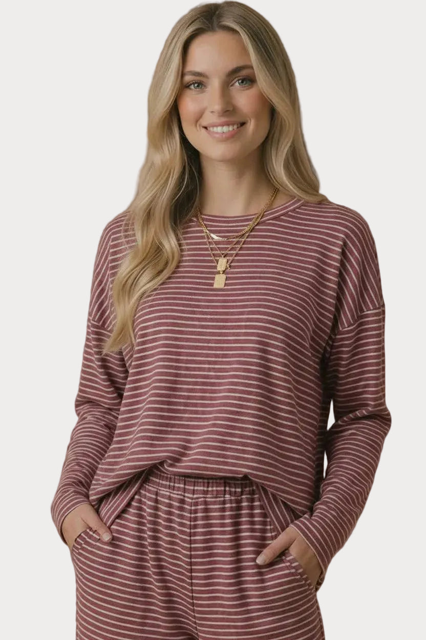Women's relaxed mulberry and cream striped long sleeve French terry tee with dropped shoulders.