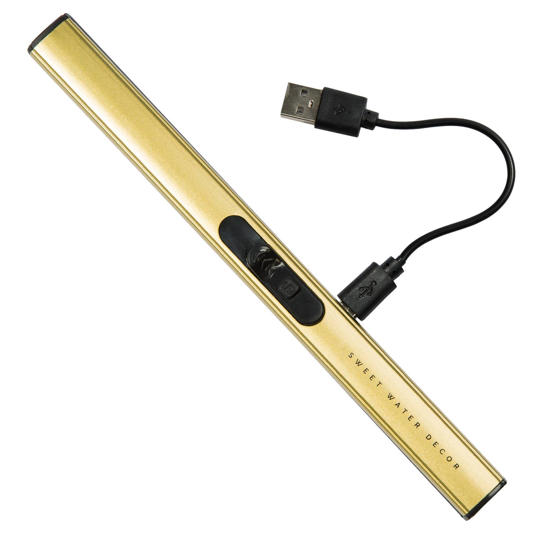 Gold USB rechargable lighter with a cable on a white background