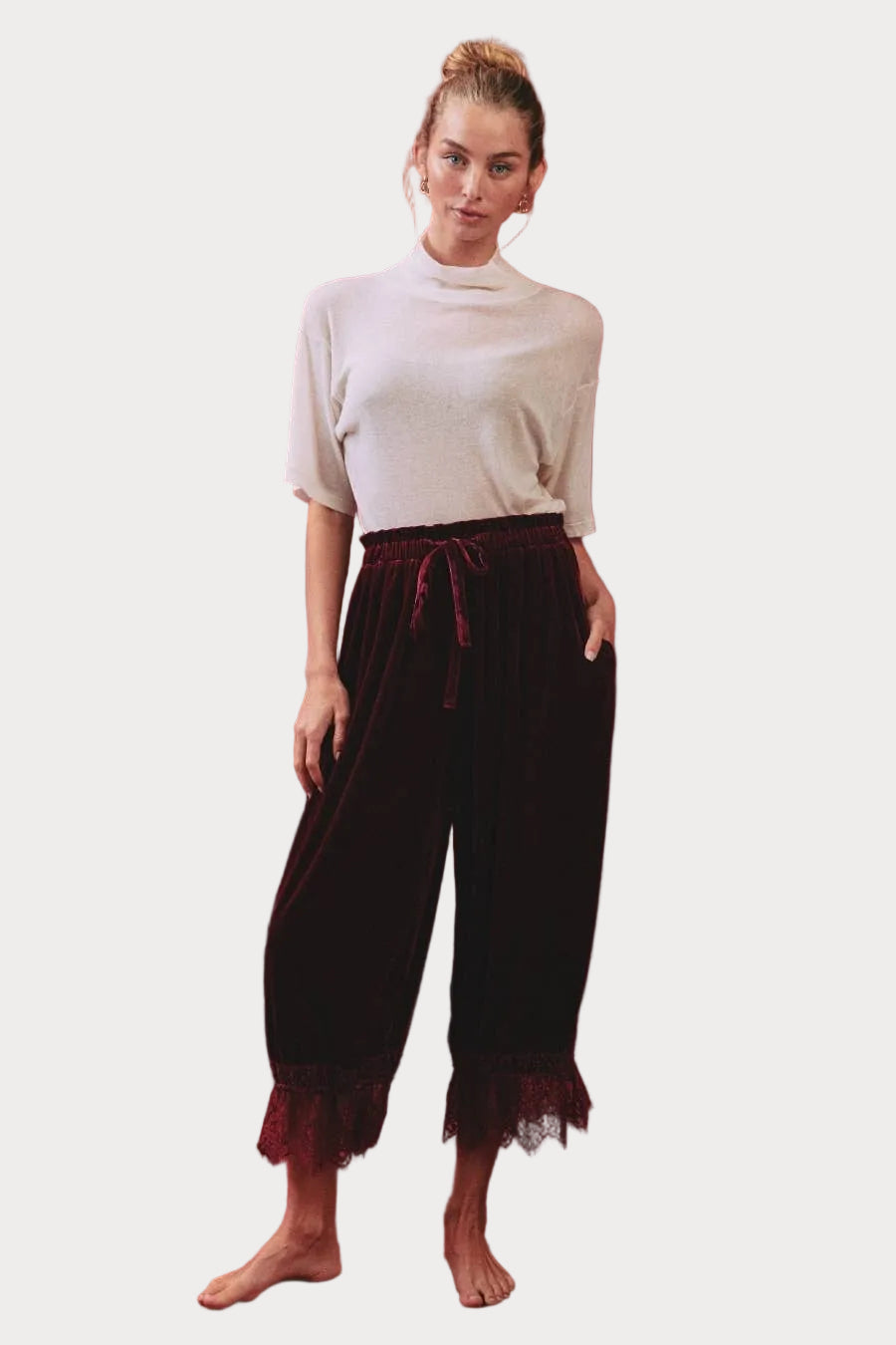 Deep merlot velvet bloomer pants with elastic drawstring waist, gathered legs and scalloped floral lace hems