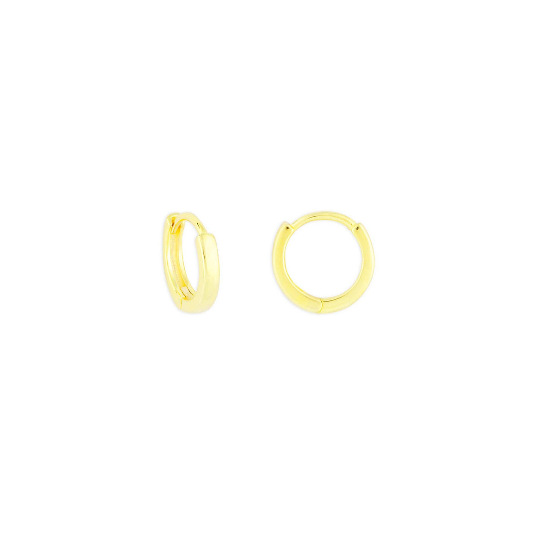 Small gold huggie earring in a petite 1/8-inch size.