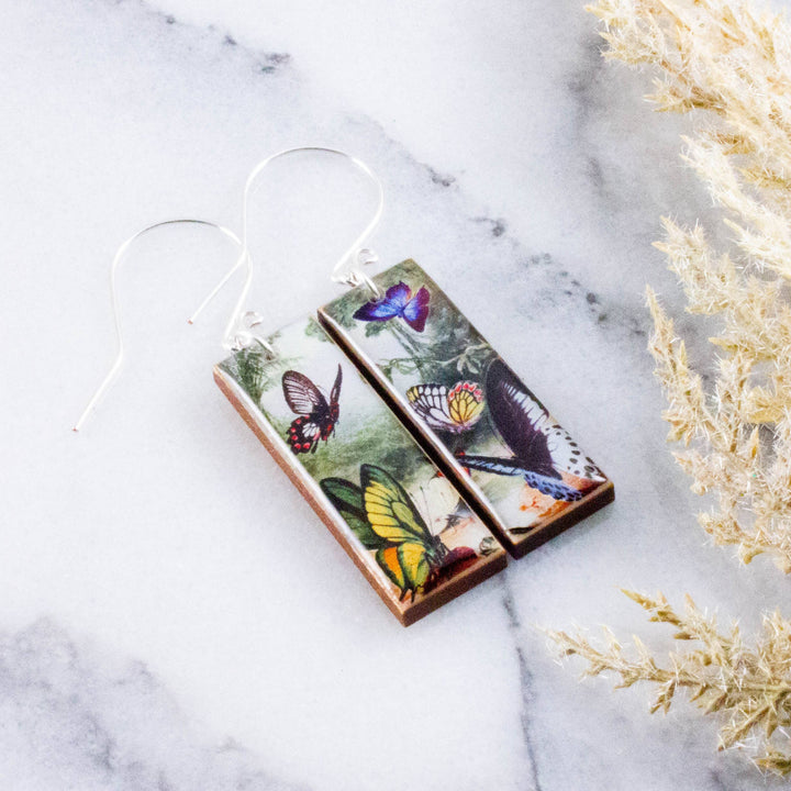 Vintage Butterfly Forest rectangle wooden earrings with colorful butterflies and sterling silver ear wires