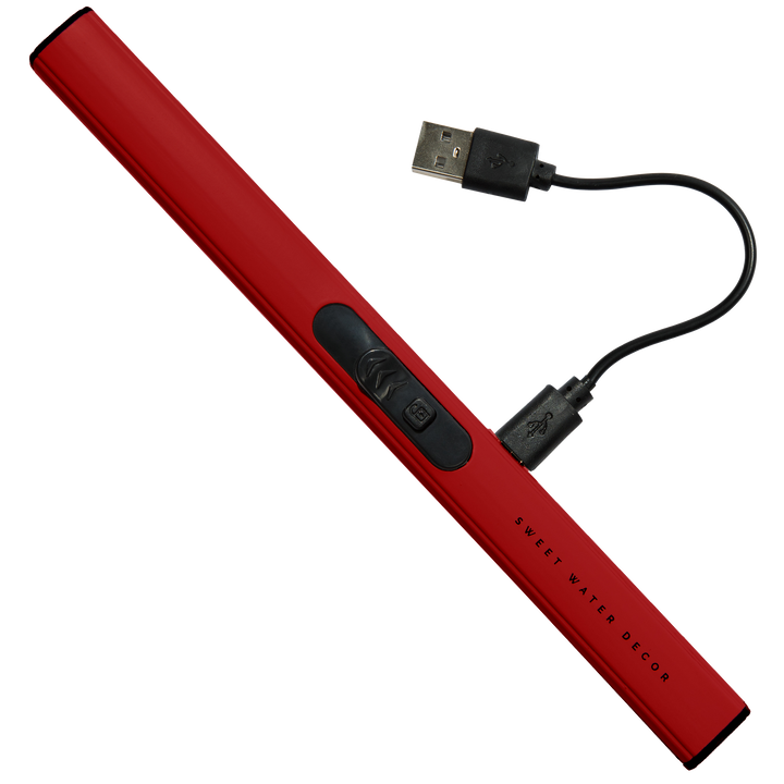 Red USB lighter a black cable on a white background