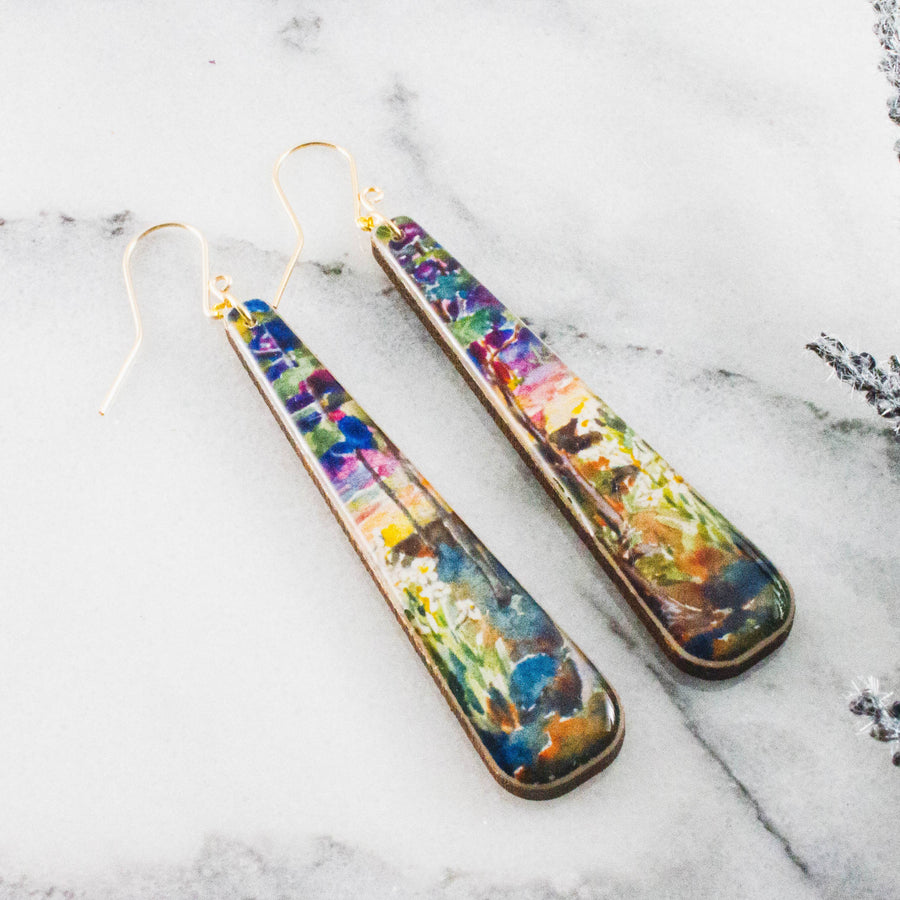 Painted sunset long wood statement earrings with colorful garden landscape design and gold-filled ear wires