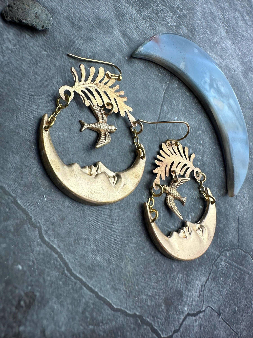 Luna Messenger Earrings with brass crescent moon faces, flying birds and botanical branch details