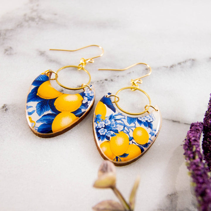 French toile lemon wooden earrings with cobalt blue botanicals, yellow lemons, brass rings and gold-filled ear wires