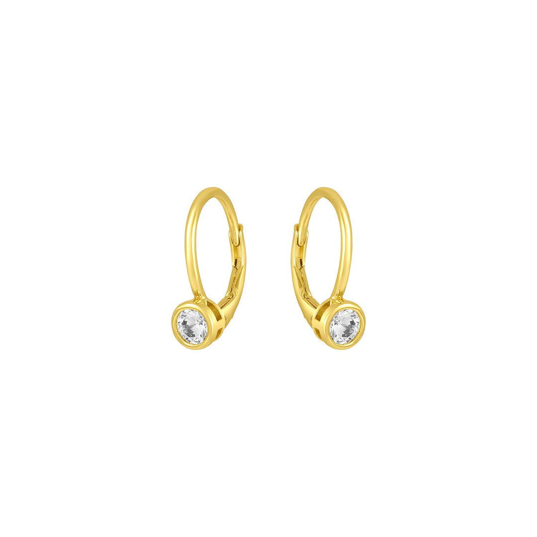 Gold huggie earrings with small bezel-set cubic zirconia drop