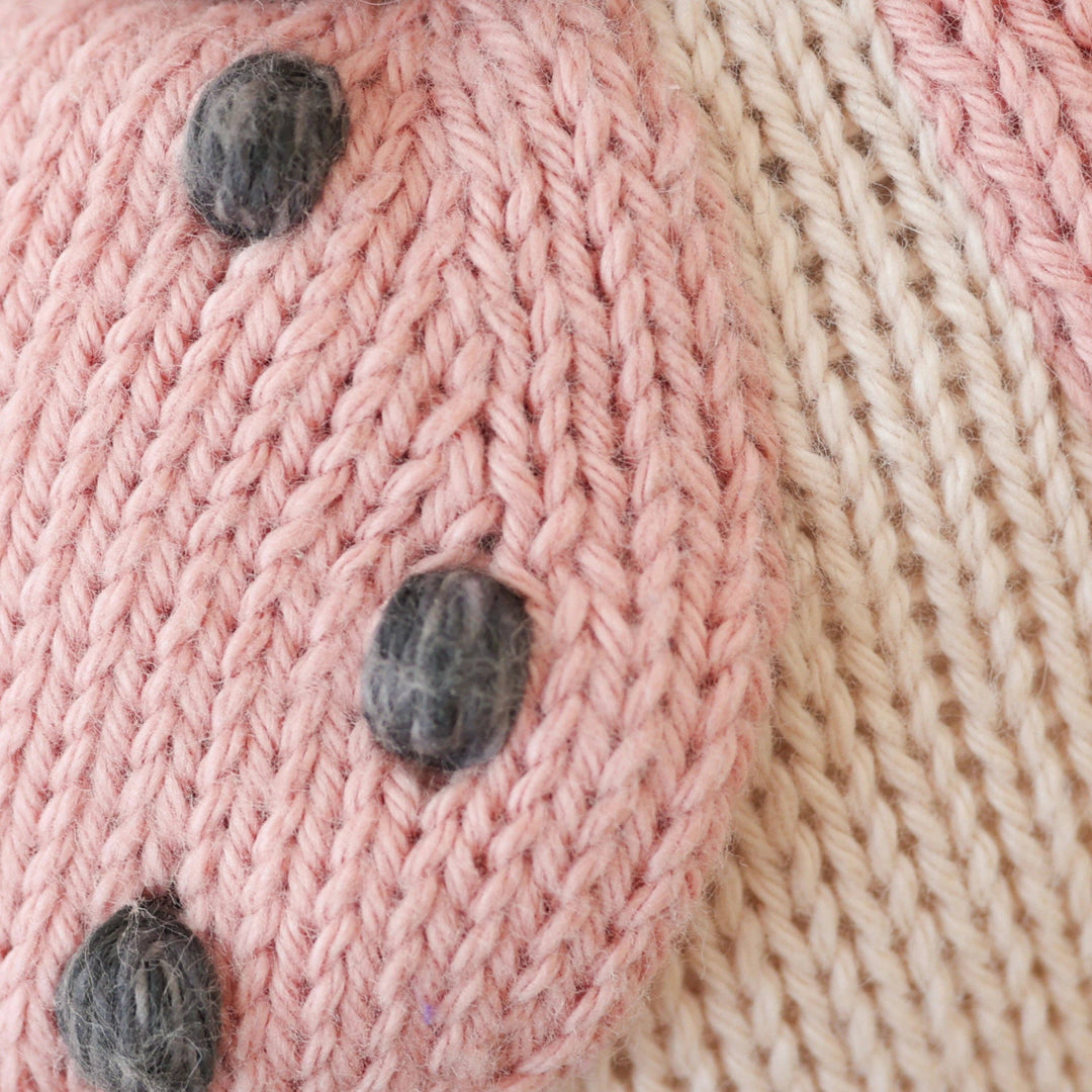 Close up of spots on knitted ladybug