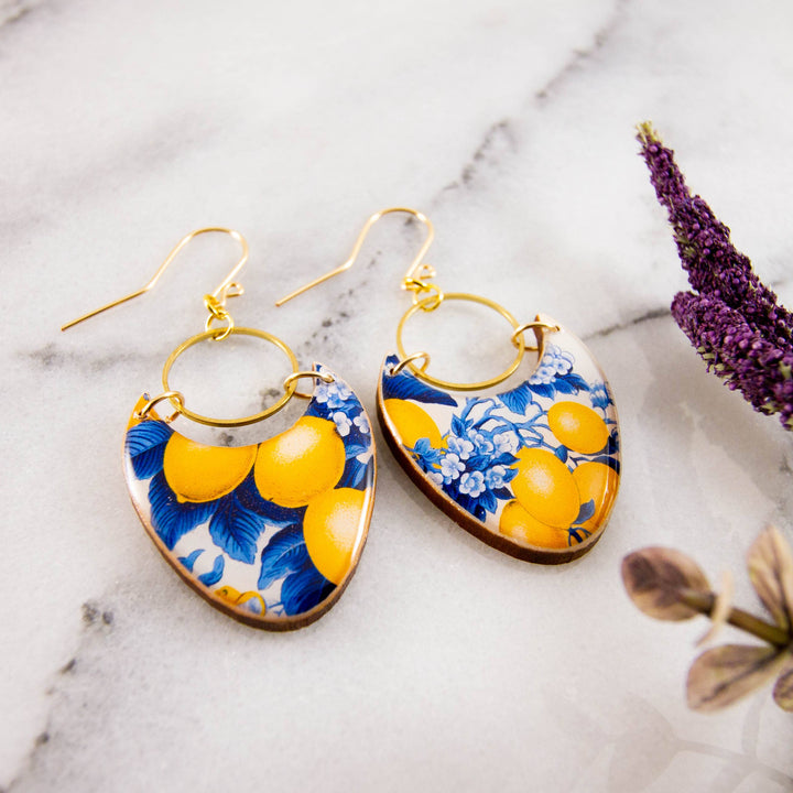 French toile lemon wooden earrings with cobalt blue botanicals, yellow lemons, brass rings and gold-filled ear wires