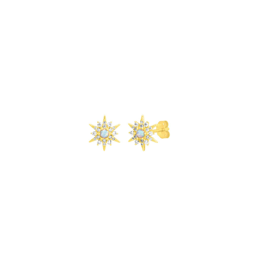 Gold starburst opal stud earrings with cubic zirconia accents.