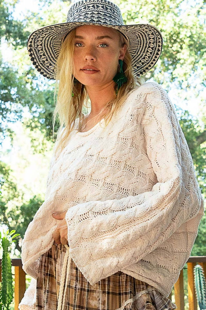 Round neck semi cropped knitted solid sweater