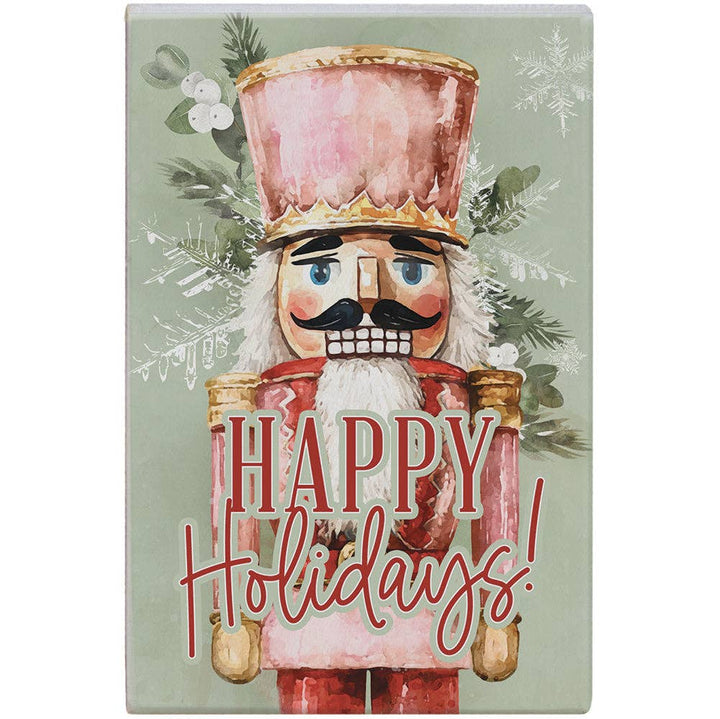 wood art block with watercolor nutcracker and “Happy Holidays” text