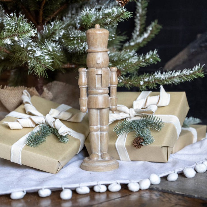 13.25 inch resin nutcracker with faux wood finish tabletop holiday décor