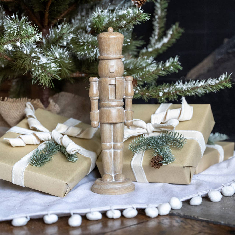 13.25 inch resin nutcracker with faux wood finish tabletop holiday décor