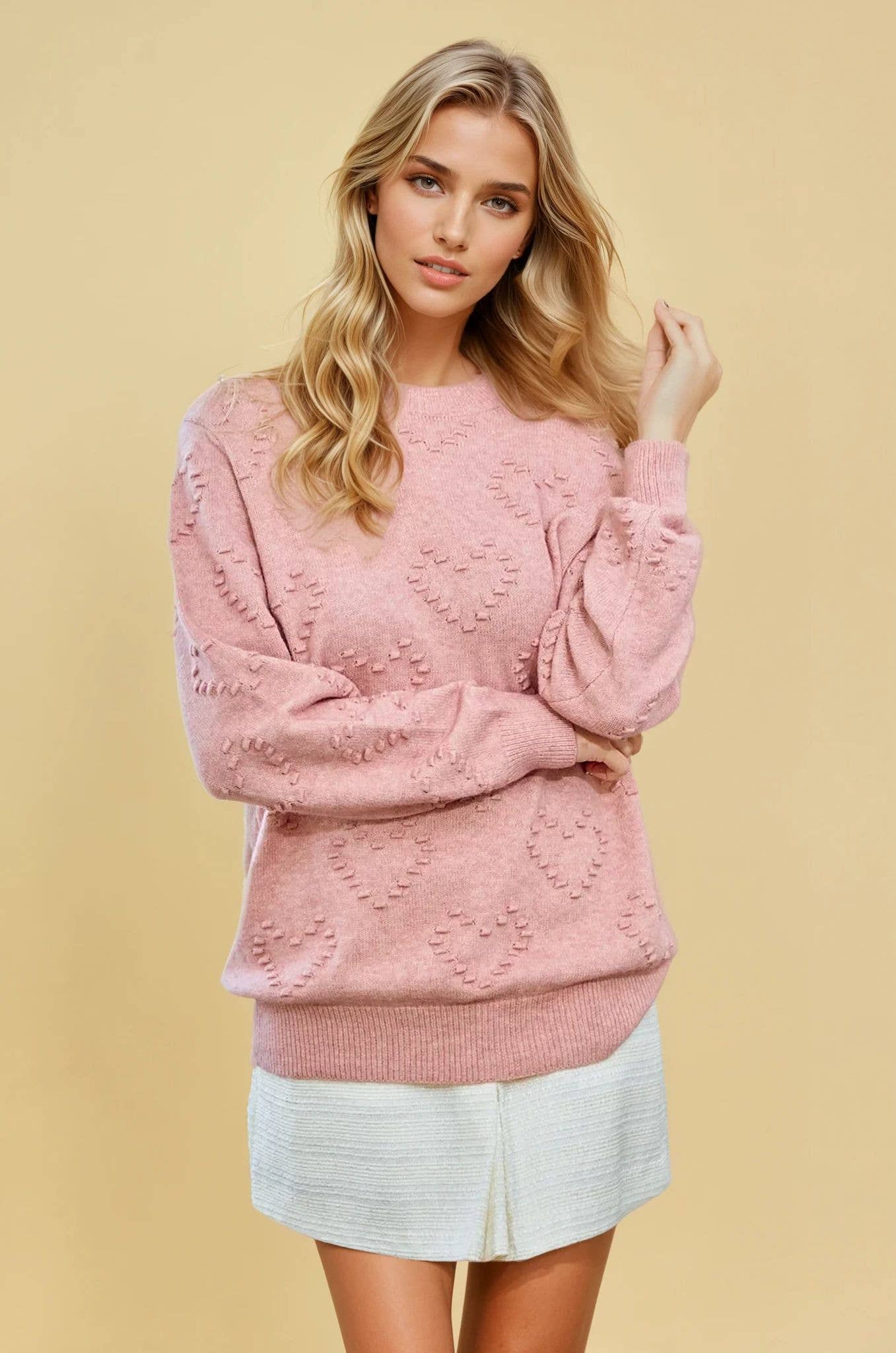 KNIT SWEATER TOP WITH HEART SHAPE DETAIL