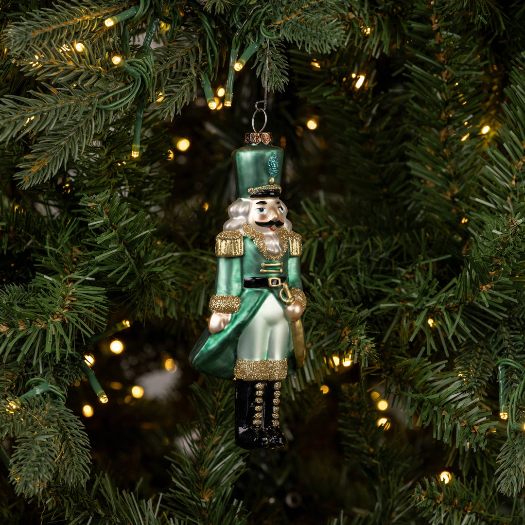 Teal Nutcracker Ornament – Glass Holiday Keepsake