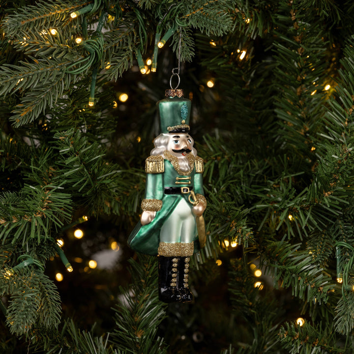 Teal Nutcracker Ornament – Glass Holiday Keepsake
