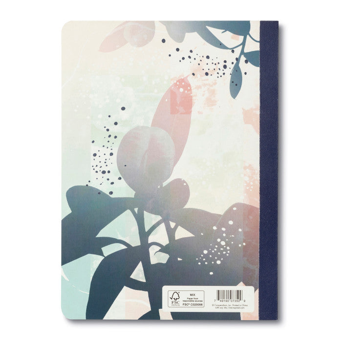 Notebook with floral design on a white background