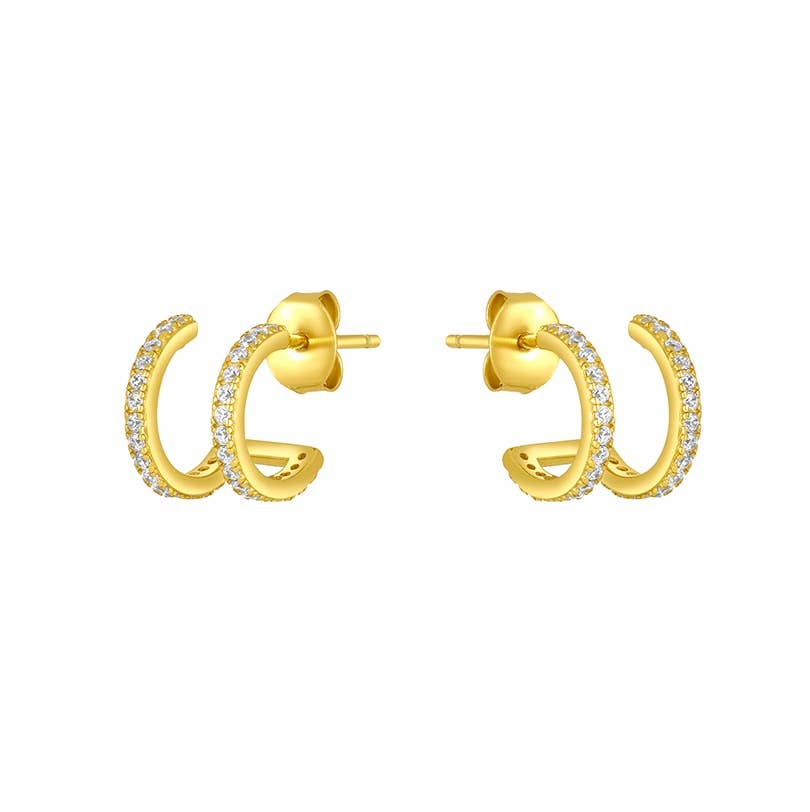 Gold huggie hoop earrings with a row of sparkling cubic zirconia stones.