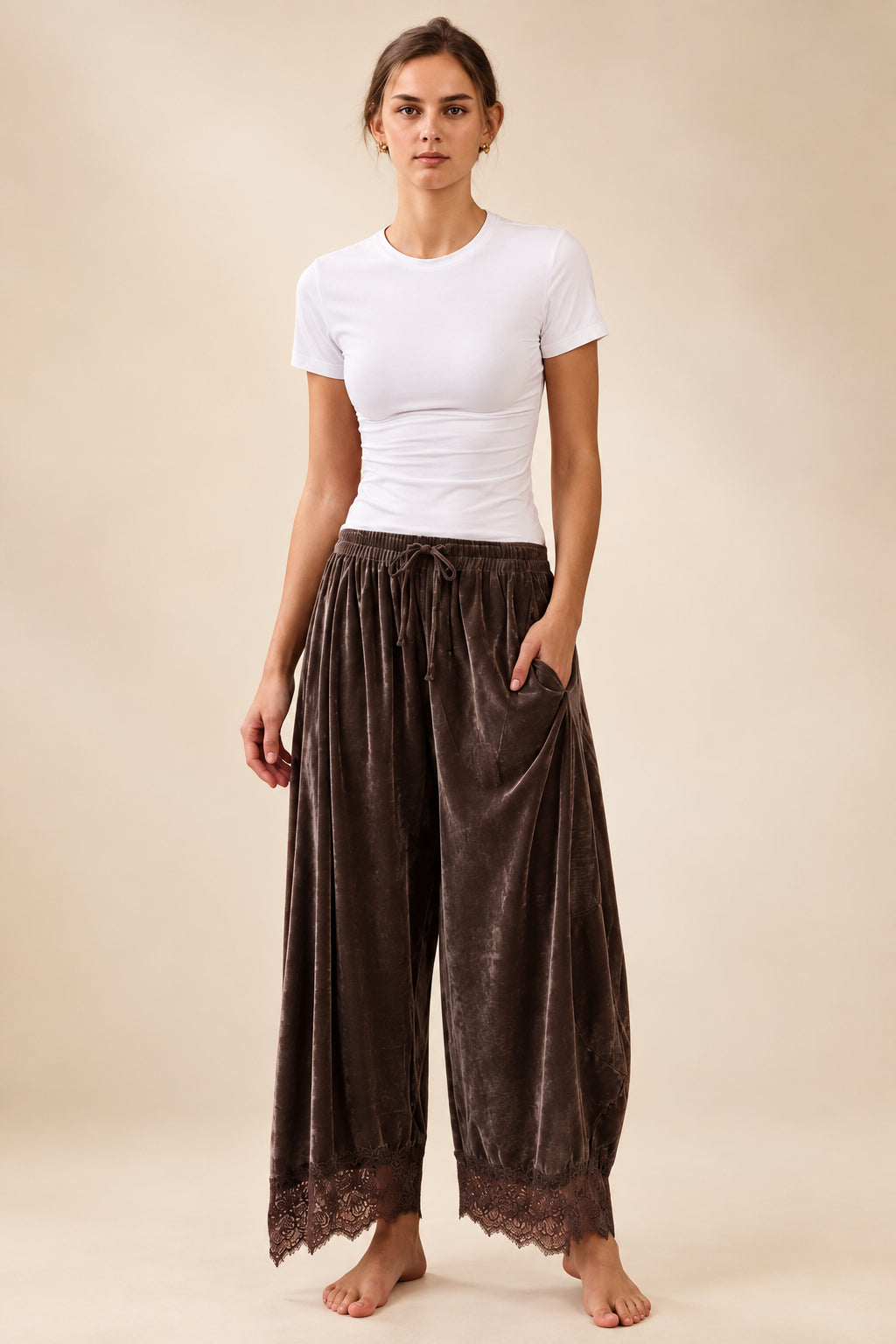 Deep brown velvet wide leg pants with elastic drawstring waistband and scalloped floral lace hem detail