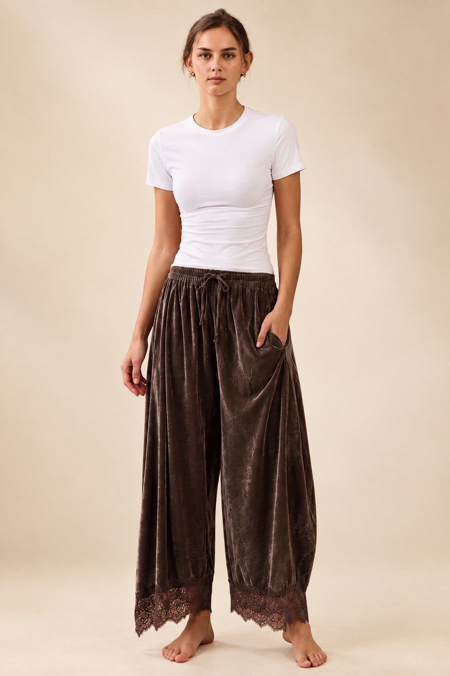Deep brown velvet wide leg pants with elastic drawstring waistband and scalloped floral lace hem detail