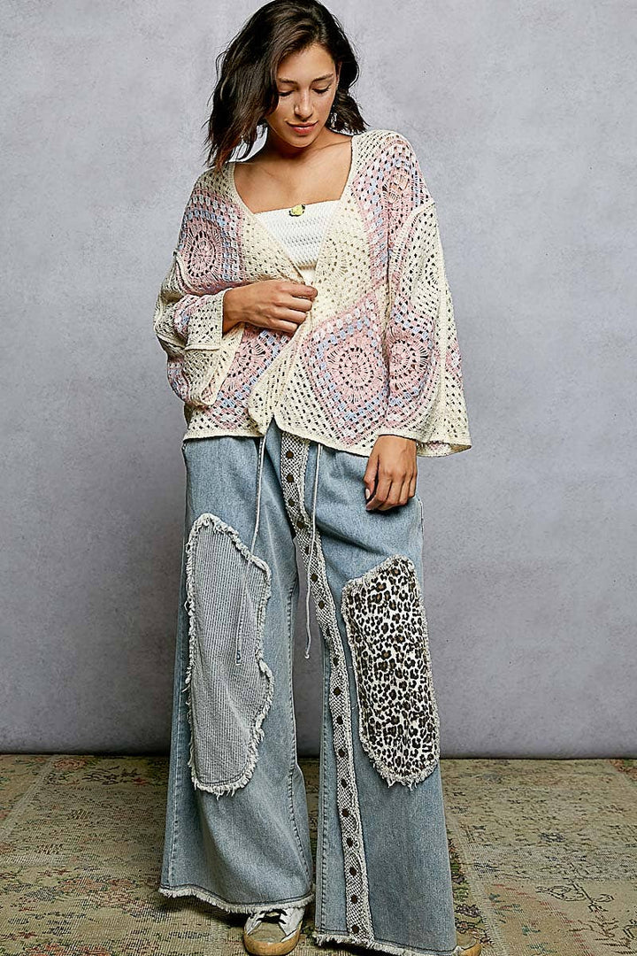 Crochet granny square cardigan with open front and relaxed fit