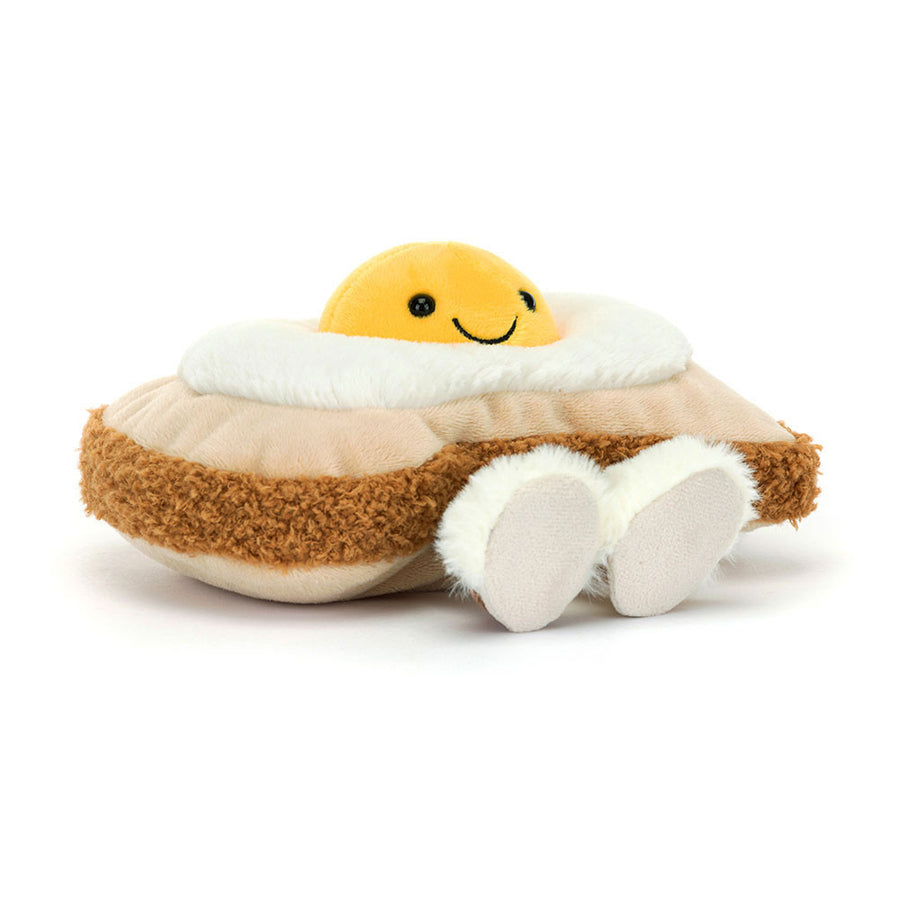 Soft plush toast with smiling sunny-side-up egg and fuzzy crust, Egglantine Egg on Toast