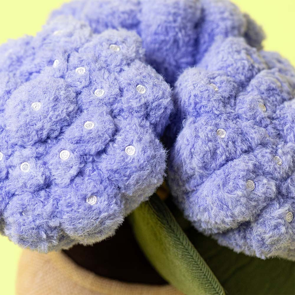 Detail shot: Plush hydrangea plant with purple blooms