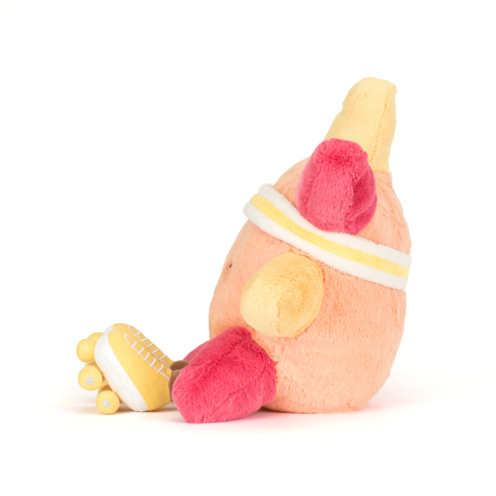 amuseables sun roller skates plush with pink and yellow roller skate details side view facing left