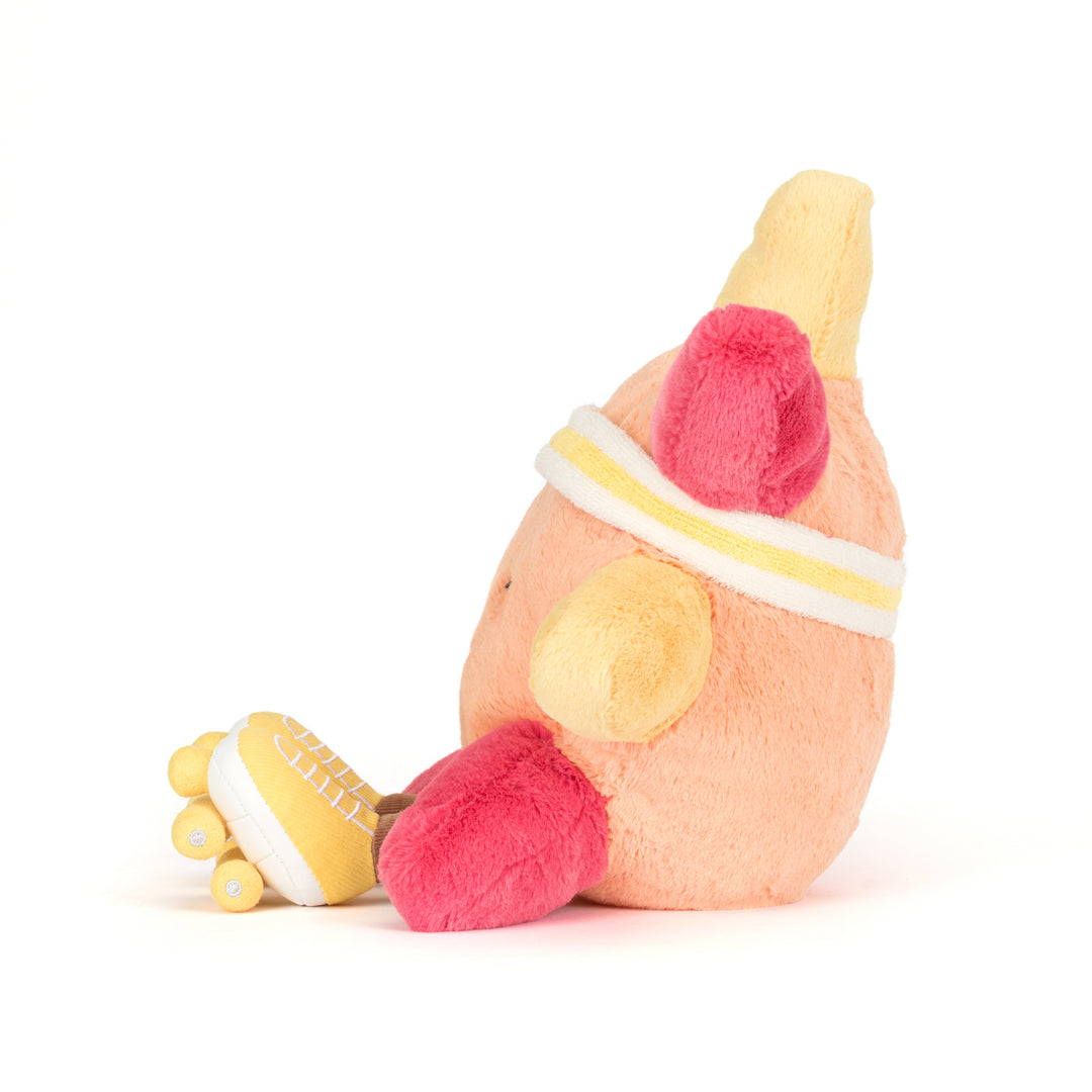 amuseables sun roller skates plush with pink and yellow roller skate details side view facing left