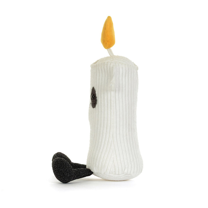 Jellycat Amuseables Flickerty Candle cream corduroy plush candle with golden flame, dark eye patches and black feet