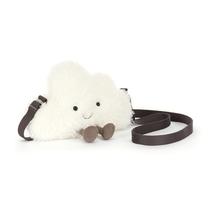 cream white fluffy cloud plush shoulder bag with smiling face, corduroy feet, adjustable strap, and zip closure on a white background